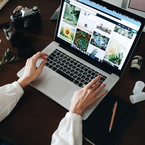 Photo of someone using a laptop.