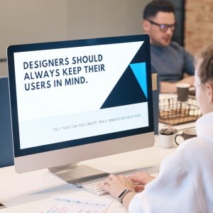 Photo of a women using a desktop computer, with the screen showing the words "Designers should always keep their users in mind"